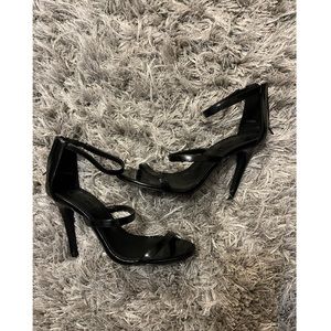 Black strapped zip up heels!